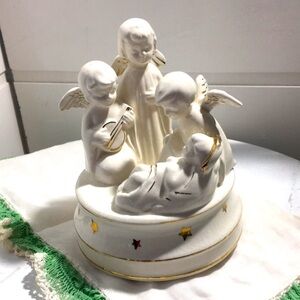 Vintage white porcelain Schmidt bros nativity musical figures.